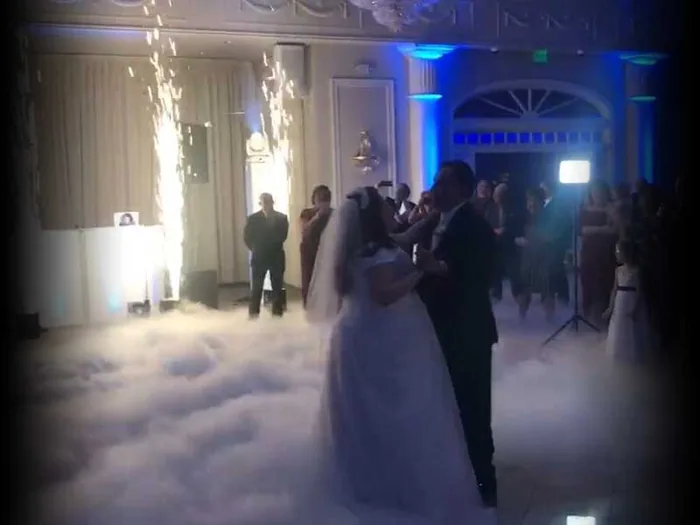 First dance on a cloud of low fog with cold sparks